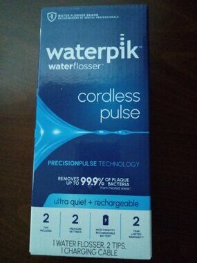 NEW UNUSED Waterpik Cordless Pulse 3100 Rechargeable Portable Water Flosser gums